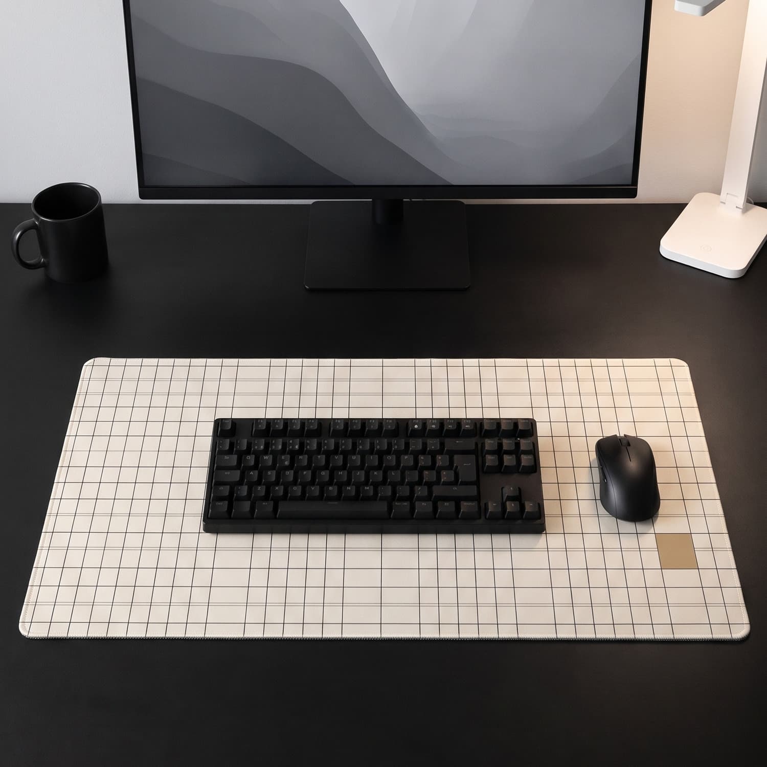 Minimal Desk Mat — Grid 01 — A fine black grid, one camel square.